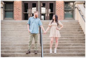 Couple laughing with Seattle wedding photographer during engagement session